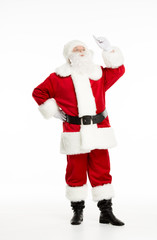 Santa Claus posing and gesturing