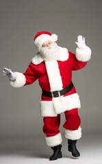 Santa Claus posing and gesturing