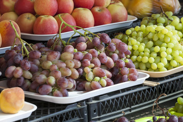 Greengrocery with fresh fruits and vegetables.