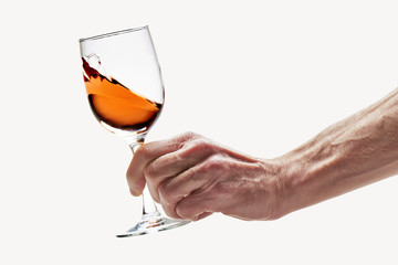 Pink wine swirled in glass ( clipping path )