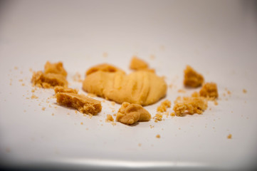Butter cookies.  Heart shaped. love. cookies broken ground into a powder.
