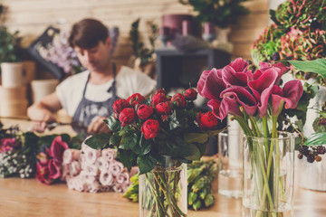 Flowers delivery shop and florist unfocused