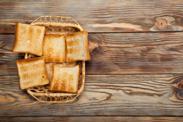 Toast on a rustic wooden background