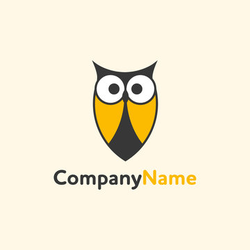 Logo owls with yellow wings. Label or print with an owl. Vector illustration.