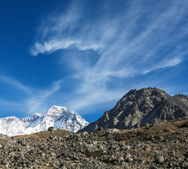 Cloudscape with the massif Cho Oyu on background - Gokyo region, Nepal, Himalayas