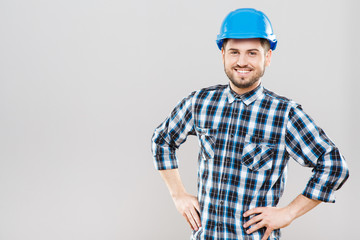 Builder in blue building helmet