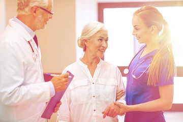 medics and senior patient woman at hospital