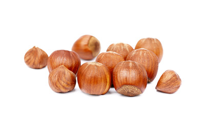 Group fresh hazelnuts isolated on white background