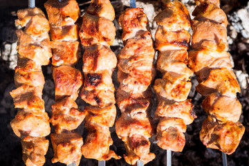 Pork shish kebab on skewers roasted on grill