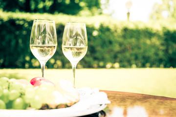 Glasses Of White Wine On Table