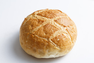 Fresh sliced white bread in close-up shot isolated on white background