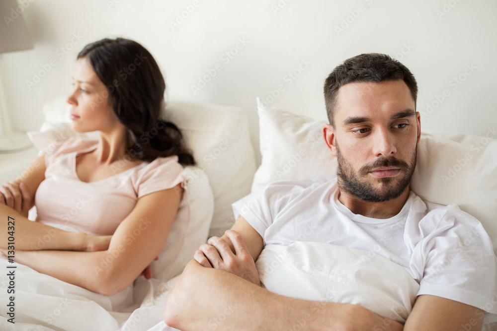 Canvas Prints unhappy couple having conflict in bed at home