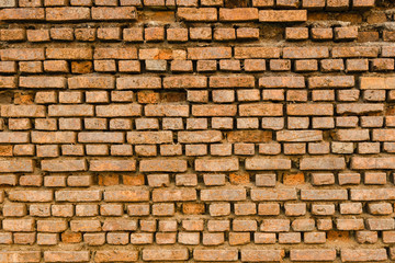 Old Ancient Vintage Grunge Dusty Orange Brick Wall With Some Cra