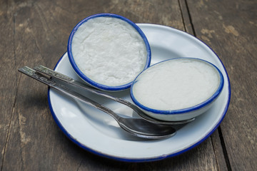 coconut milk custard in the small porcelain cup