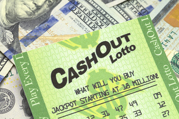 Fototapeta premium Lottery Ticket and Cash Close Up