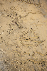 Drawings on the beach sand. Cartagena, Región de Murcia, Spain, Europe.