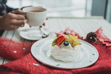 Beautiful white dessert on a red napkin