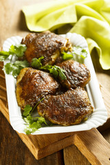 Chicken, baked with spices and coconut milk