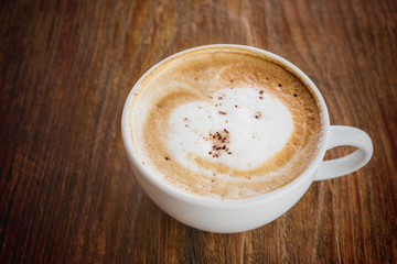 Coffee cup on wooden table