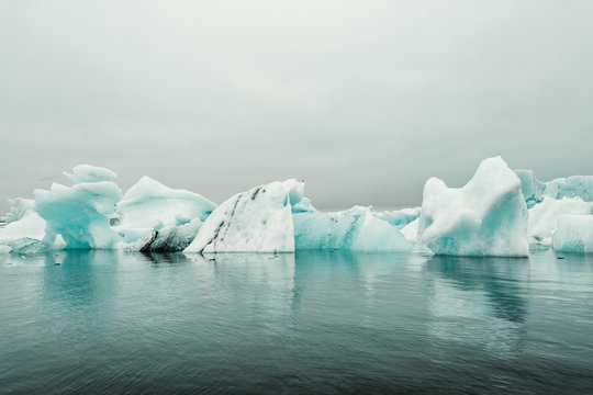 Icebergs reflected on sea 