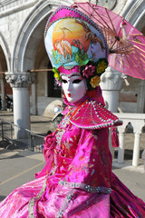 Obraz premium Carnival of Venice, beautiful masks at St. Mark's Square, Italy. 10.Feb.2013.