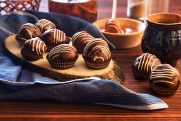 Chocolate profiteroles with honey and tea