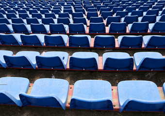 Fototapeta premium empty chairs on the stadium without an audience bleachers