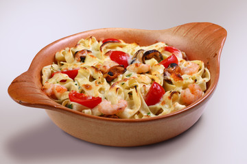 Pasta. Seafood Pasta with Shrimp, Scallops and Tomato. Italian Cuisine. Mediterranean food.