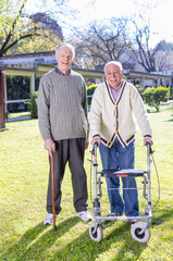 Senior retired friends happy in rehab clinic garden