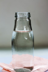 Drinking water in bottles on the floor.