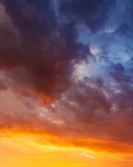 Naklejka na ściany i meble Fiery vivid sunset sky clouds
