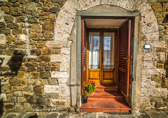 door in a rustic facade in Tuscany