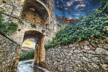 Monteriggioni city wall under a colorful sky