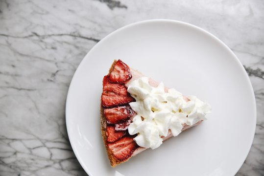 Portion of strawberries and cream pie 