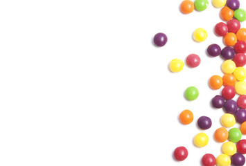 white background with colorful small rounded candies