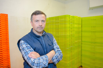 Fototapeta premium man posing with crates