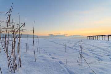 Jetty at Lake Chiemsee in Winter at sunset