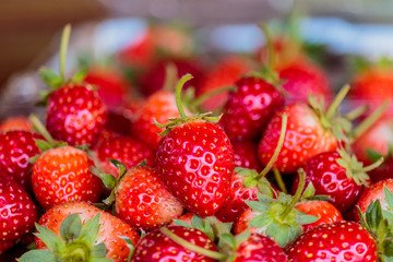 Fresh strawberries on old table wood