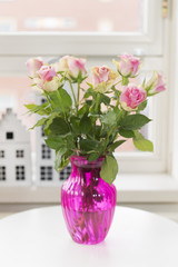 Bouquet roses in interior