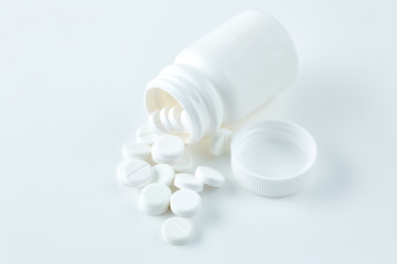 Aluminium blister pack of pills. The capsules are packaged in blisters, isolated on a white background. Disease. Flu. Medications.