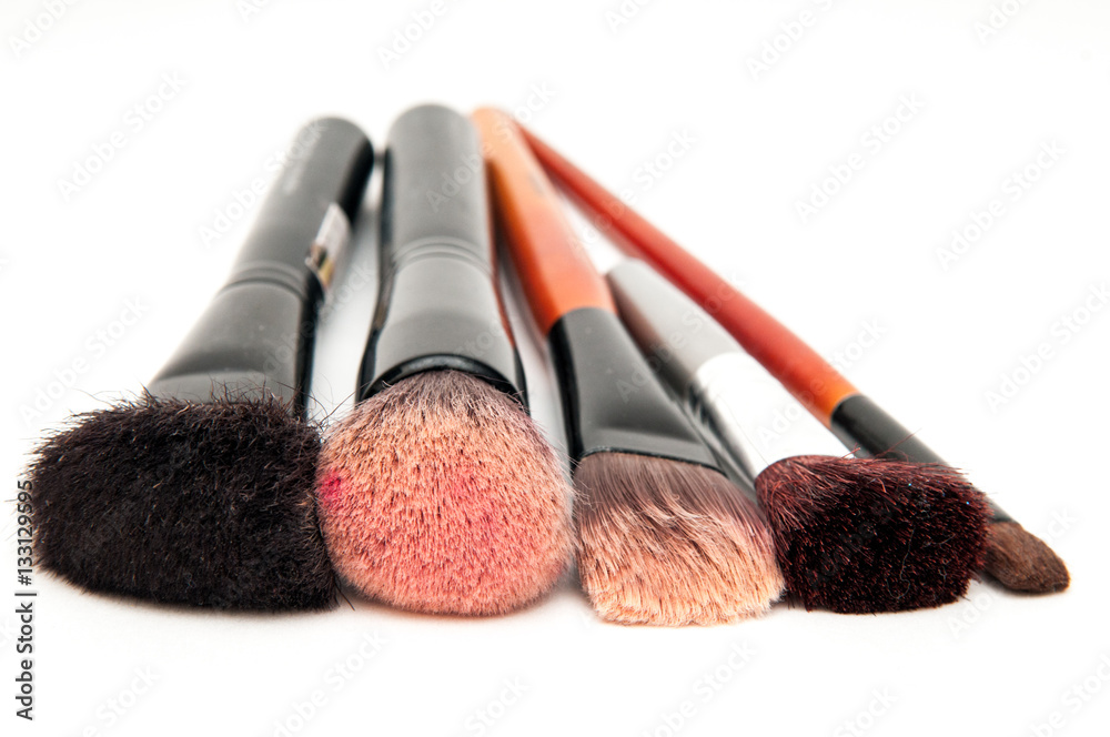 Wall mural make up brushes for face powder isolated on white