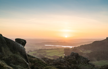 Obraz na płótnie Canvas Golden sunset from the top of the Black Rocks, Peak District, Derbyshire