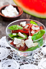 Salad  with grilled watermelon and feta with basil and spinach l