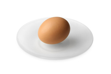 Raw egg in plate on white background