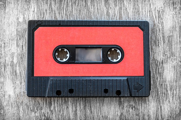 red audio tape wood background vintage