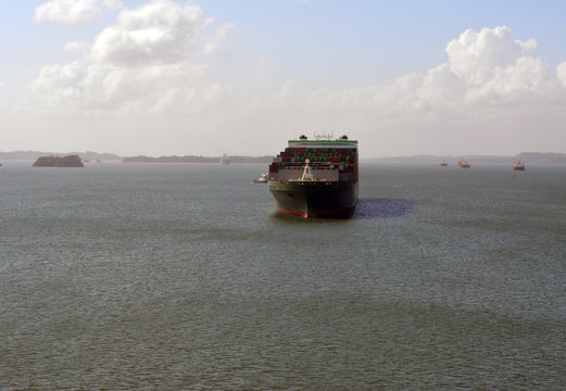 Green Cargo Ship Panama/Large green cargo ship in Gatun Lake at the Panama Canal