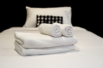 white towels on bed