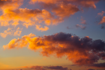 Obraz na płótnie Canvas Fiery orange colorful sunset sky as background