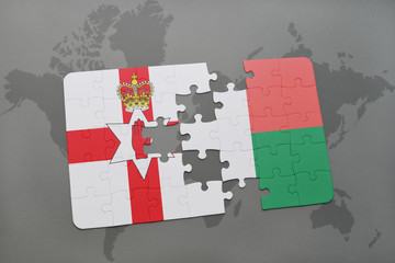 puzzle with the national flag of northern ireland and madagascar on a world map