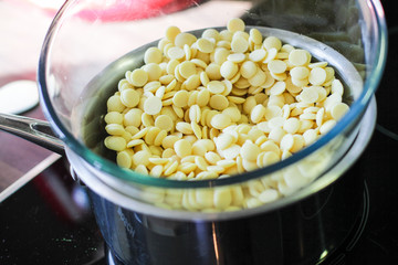 White chocolate chips in the glass bowl